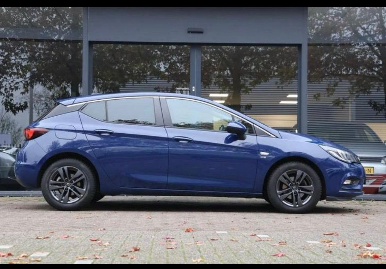 Opel Astra 1.4 Turbo 150pk Start/stop Aut 2019 Blauw, Auto's, Opel, Dealer onderhouden, 15 km/l, Zwart, 150 pk