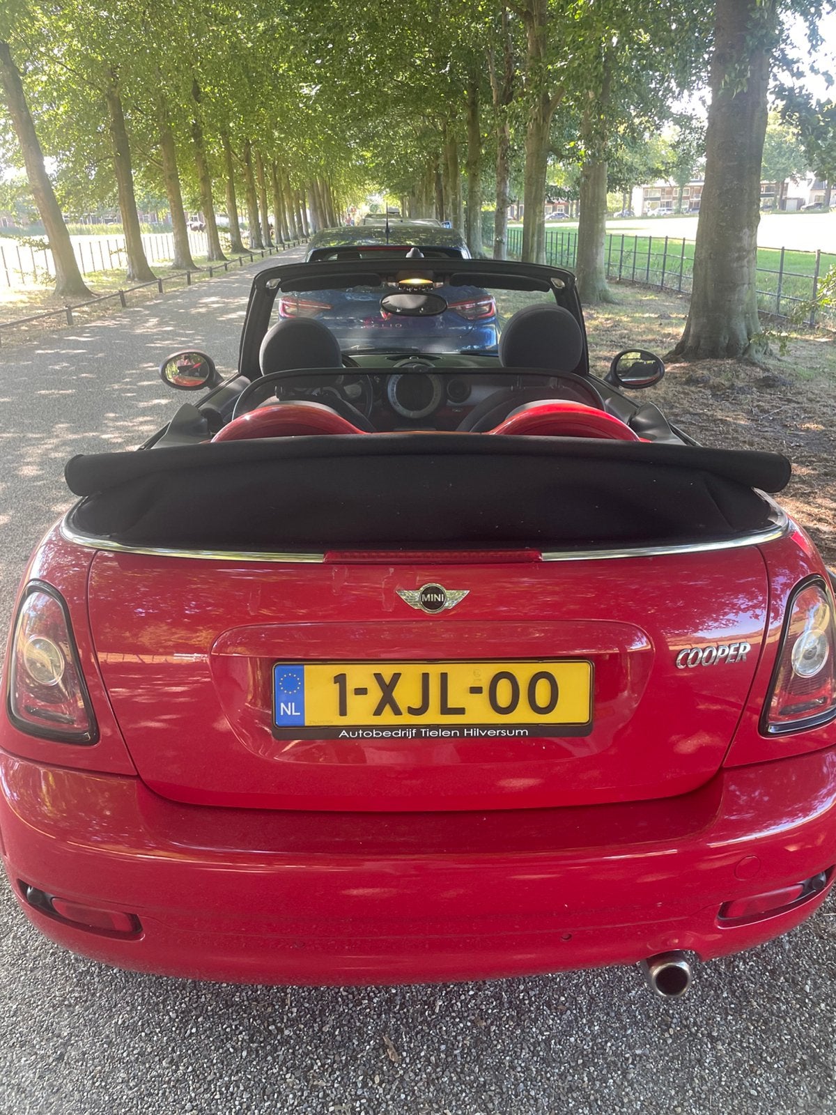 Mini Cooper Cabrio 1.6 120pk 2009 Rood, Auto's, Stof, Zwart, 4 cilinders, Cabriolet