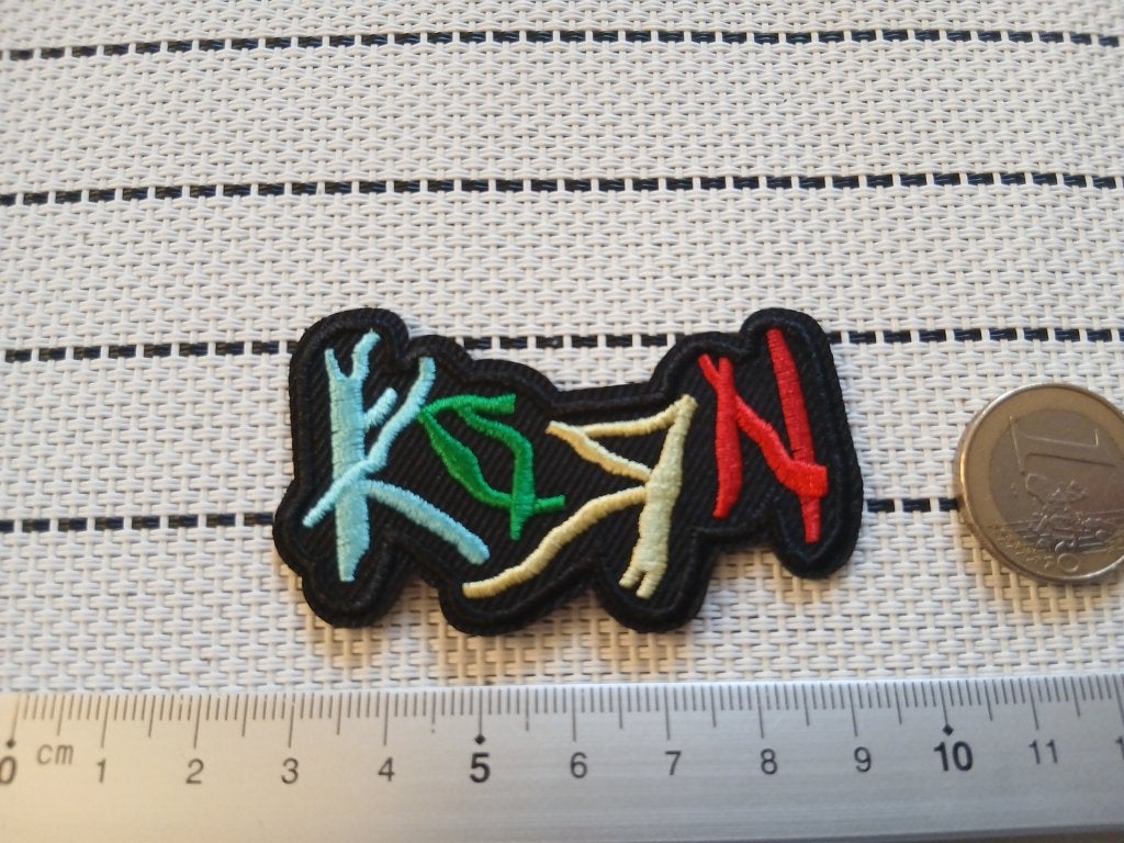 Korn mooie  shaped patch k15- 4 x 6.5 cm, Ophalen of Verzenden, Nieuw, Kleding