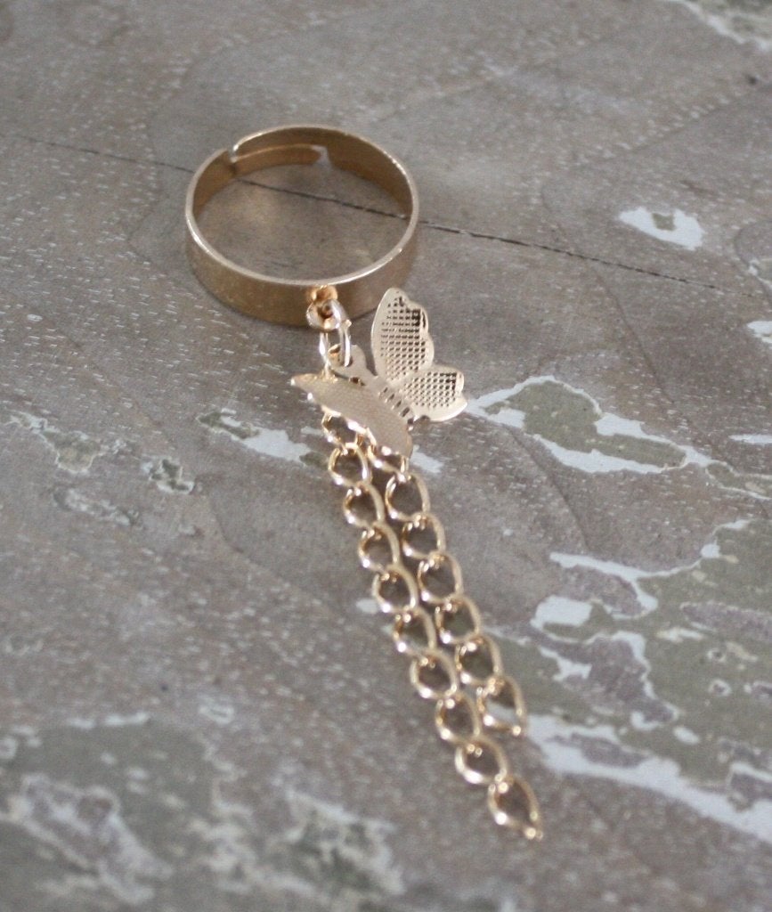goud kleurige ring verstelbaar met vlinder, Nieuw, Ophalen of Verzenden, Dame, Goud