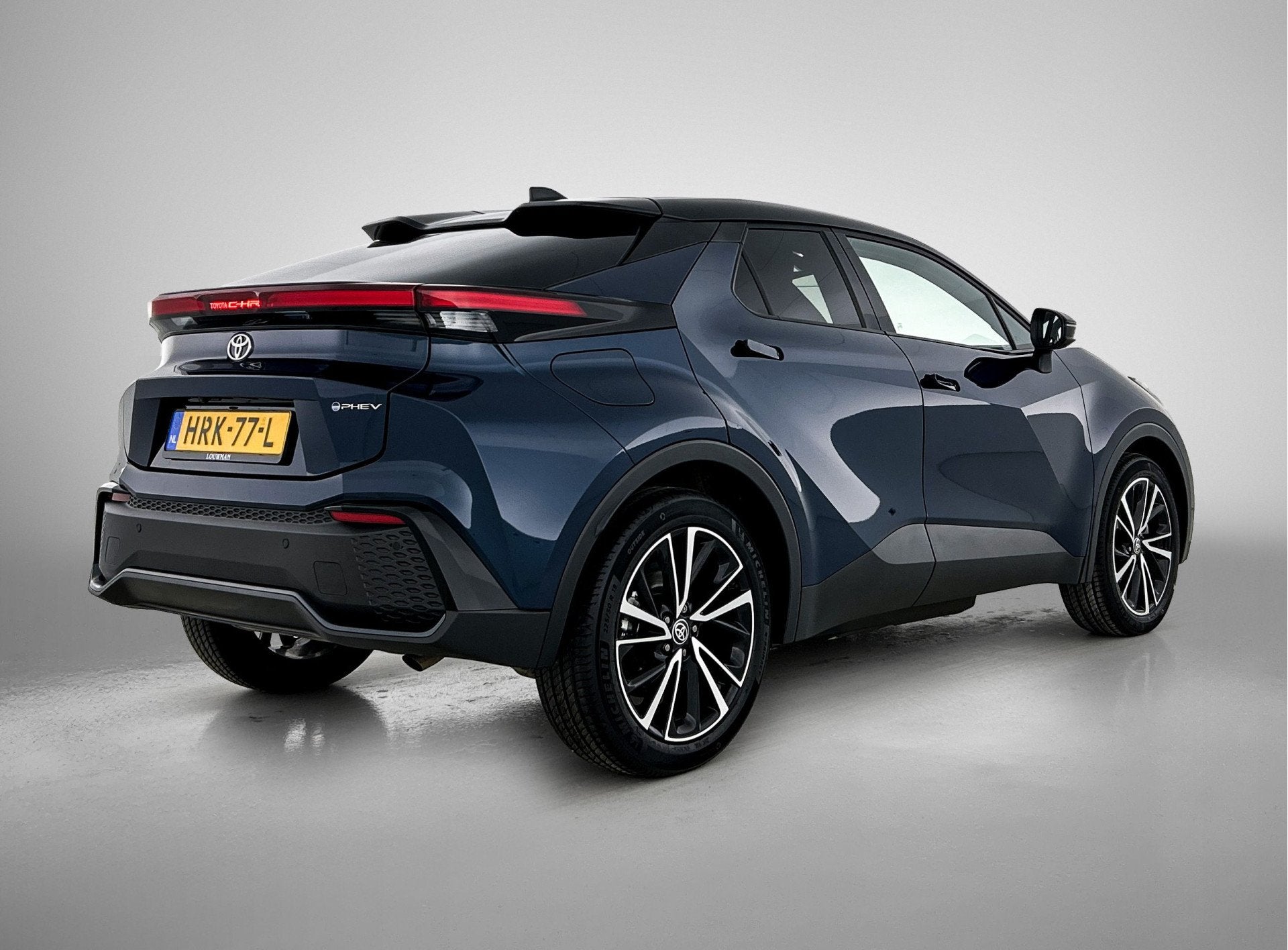Toyota C-HR 2.0 Plug-in Hybrid 220 Executive | Navigatie | J, Auto's, Toyota, 12 maanden, 4 cilinders, Blauw, Leder en Stof