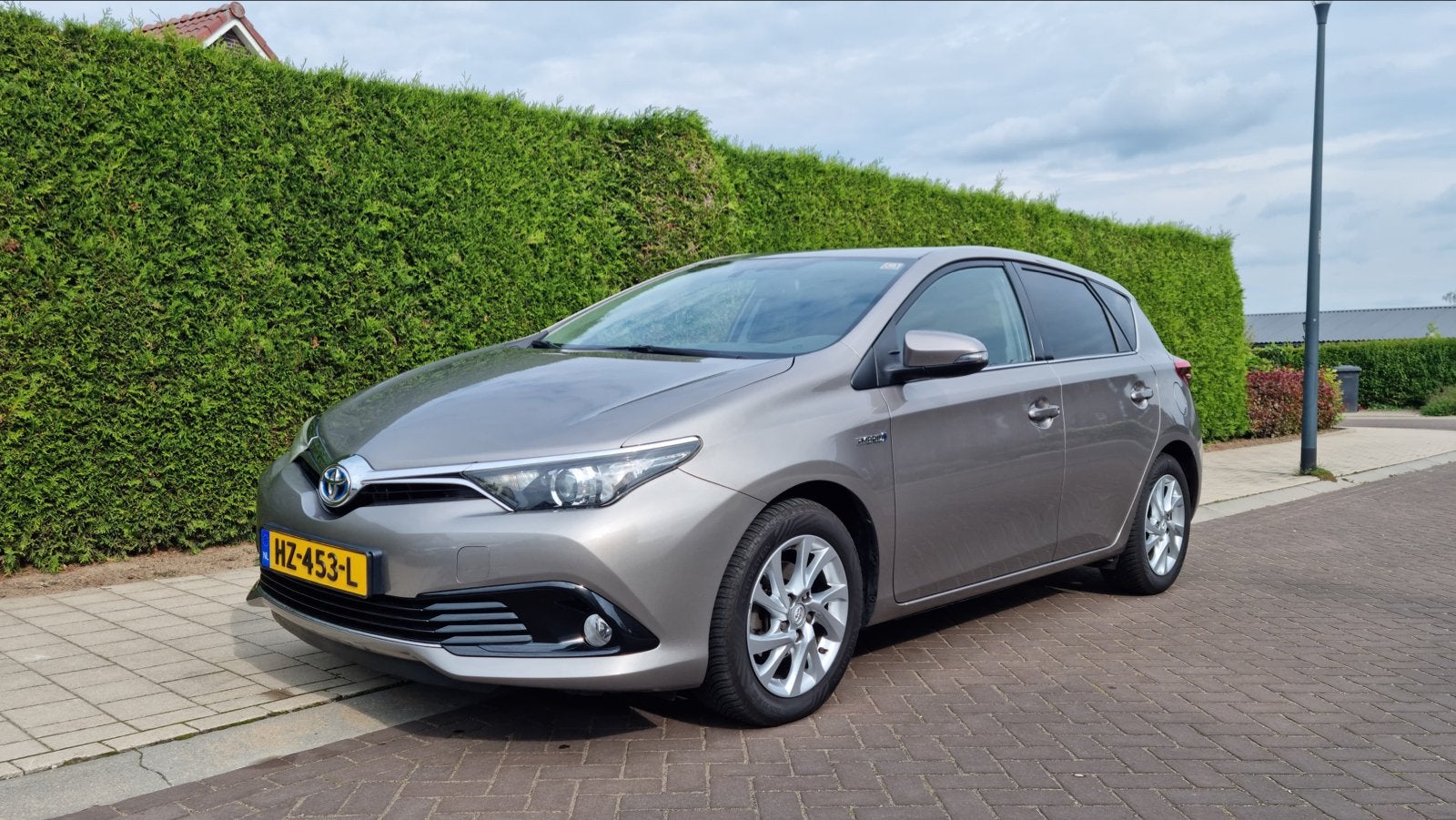 Toyota Auris 1.8 Hybrid 5DR CVT 2016 Brons, 28 km/l, Bruin, Origineel Nederlands, 1798 cc