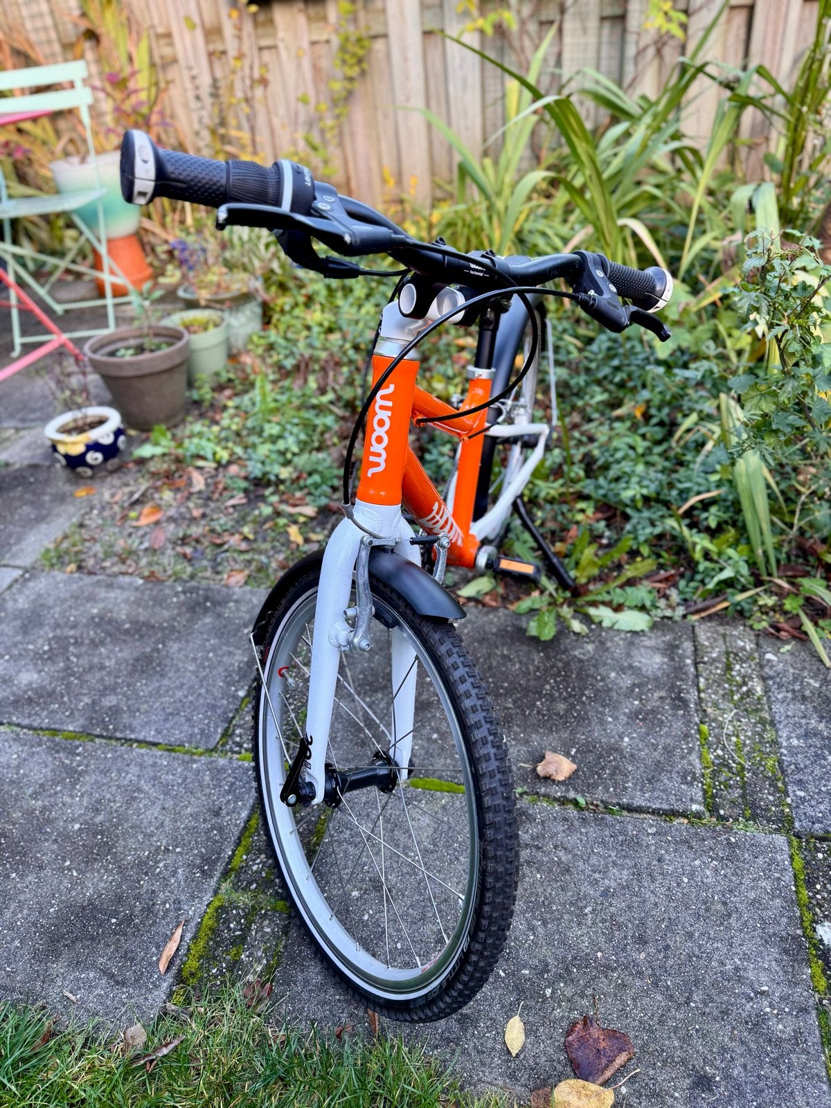 Woom 4 Original Kinderfiets - Oranje (2025), Ophalen, Gebruikt, Velgrem, 20 inch of meer