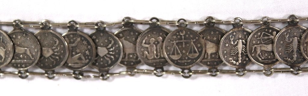 Armband( Zilverkleurig)Dierenriem, Sieraden, Tassen en Uiterlijk, Armbanden, Ophalen of Verzenden, Zo goed als nieuw, Zilver, Overige materialen