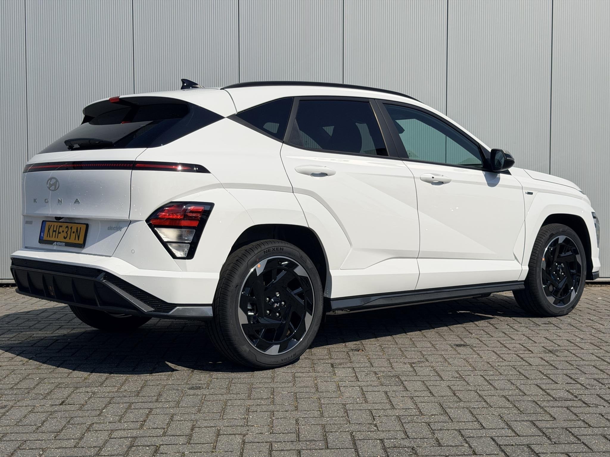 Hyundai Kona Electric N Line Business 64.8 kWh / Warmtepomp, Auto's, Stof, 750 kg, Wit, Origineel Nederlands