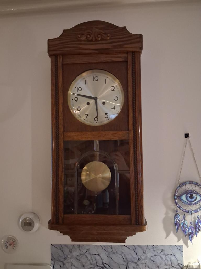 Antieke houten wandklok, Ophalen