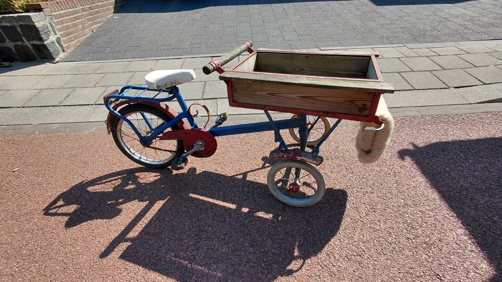 Antieke Kinder bakfiets, Ophalen