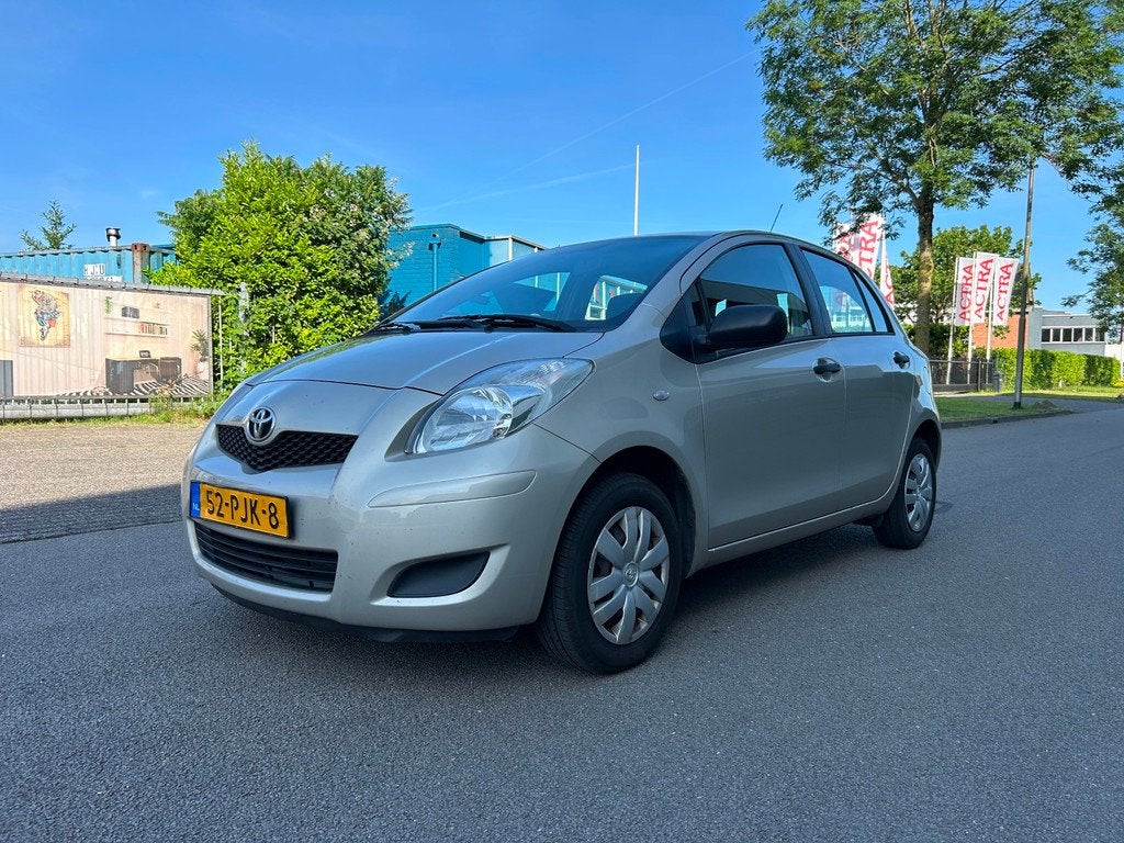 Toyota Yaris 1.0 VVTi Acces Airco, Voorwielaandrijving, Euro 5, Stof, Beige