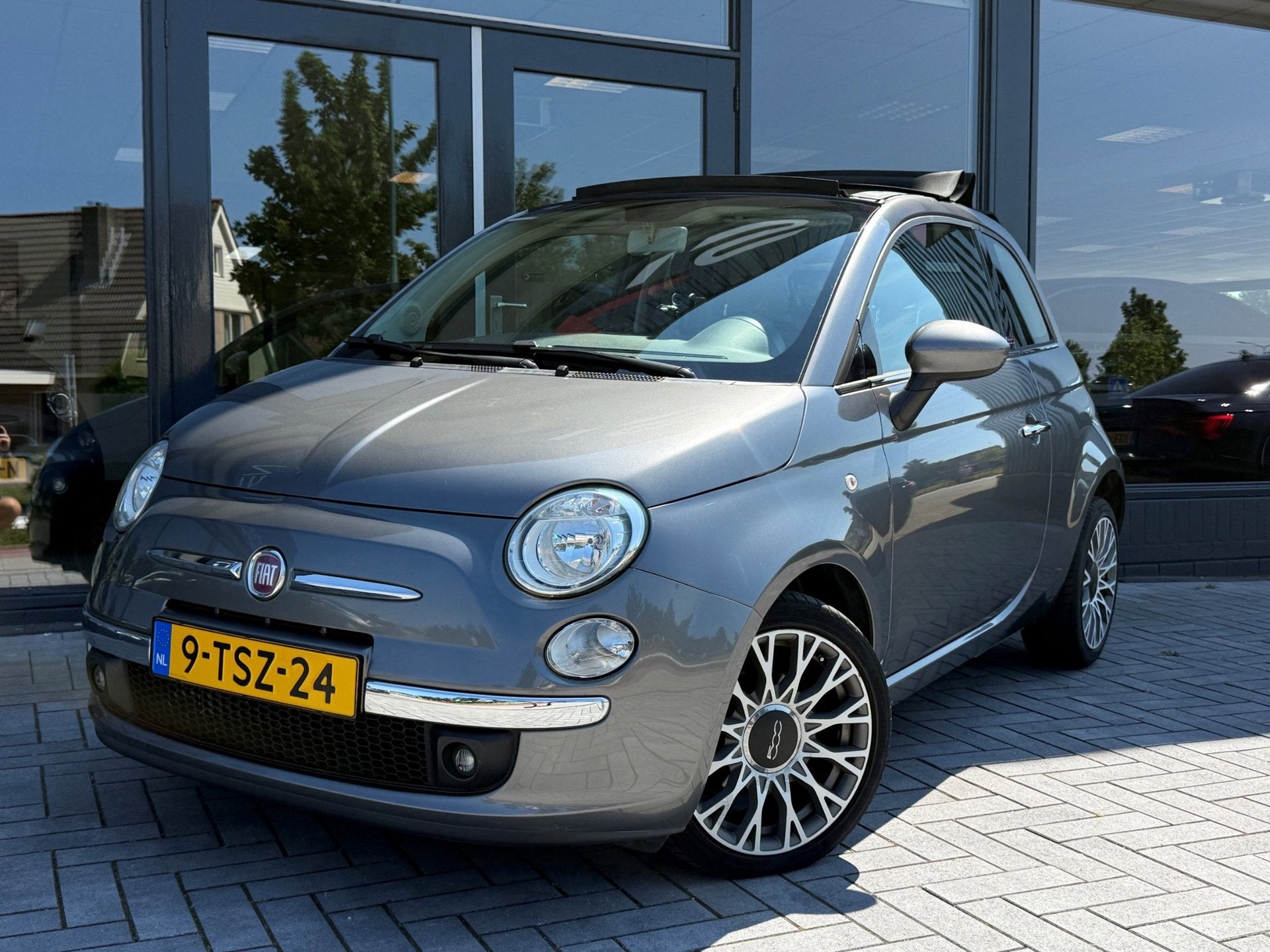 Fiat 500 C 0.9 TwinAir Turbo Lounge Navi Pdc Nap, Gebruikt, Cabriolet, Leder en Stof, Parkeersensor