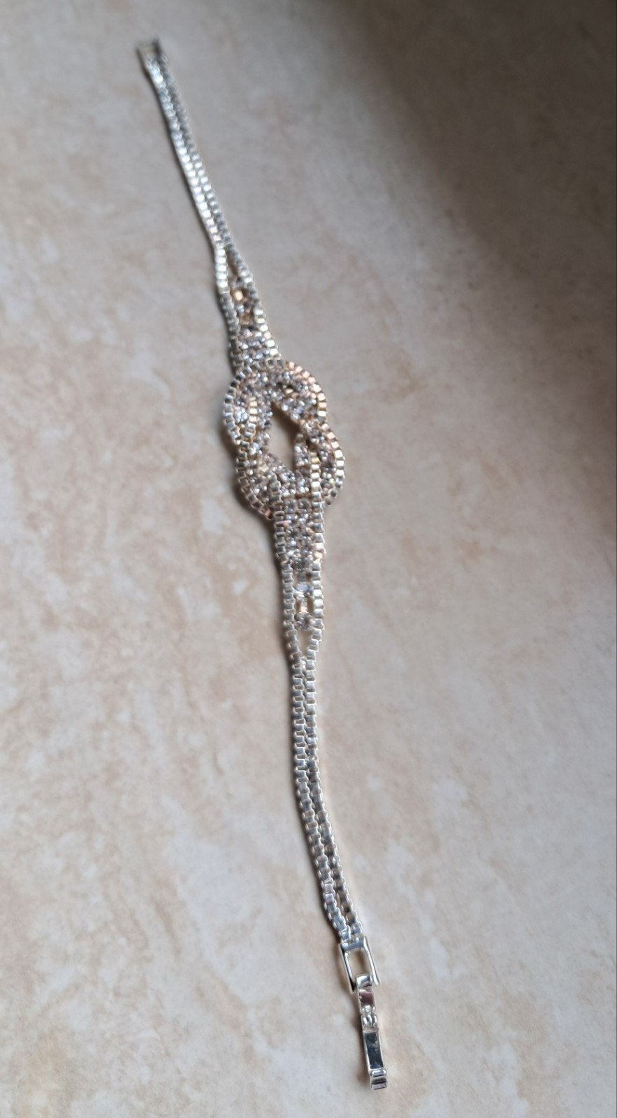 Strass armbandje "knoop", Ophalen of Verzenden, Zilver