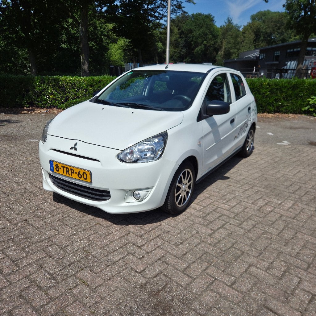 Mitsubishi Space Star 1.0 2014 Airco Wit Nieuwe APK NAP, Voorwielaandrijving, Euro 5, Stof, Wit