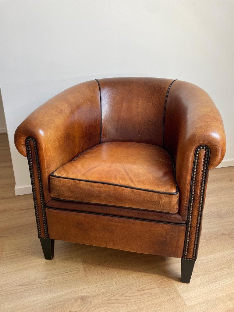 Twee Lounge Atelier schapenleren clubfauteuils, Ophalen