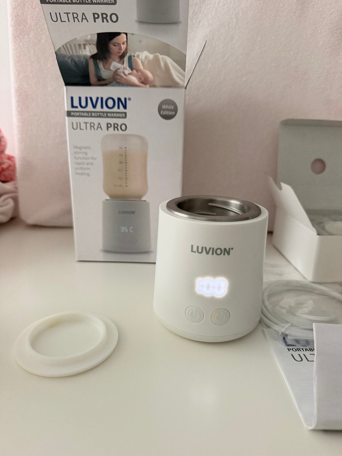 Luvion Ultra Pro Draagbare Flessenwarmer - Zo goed als nieuw, Flessen- of potjesverwarmer, Luvion, Ophalen of Verzenden, Zo goed als nieuw