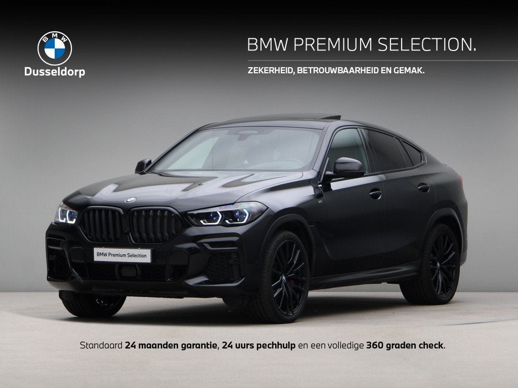 BMW X6 M50i High Executive (bj 2022, automaat), Auto's, BMW, Gebruikt, 4395 cc, Zwart, Bedrijf
