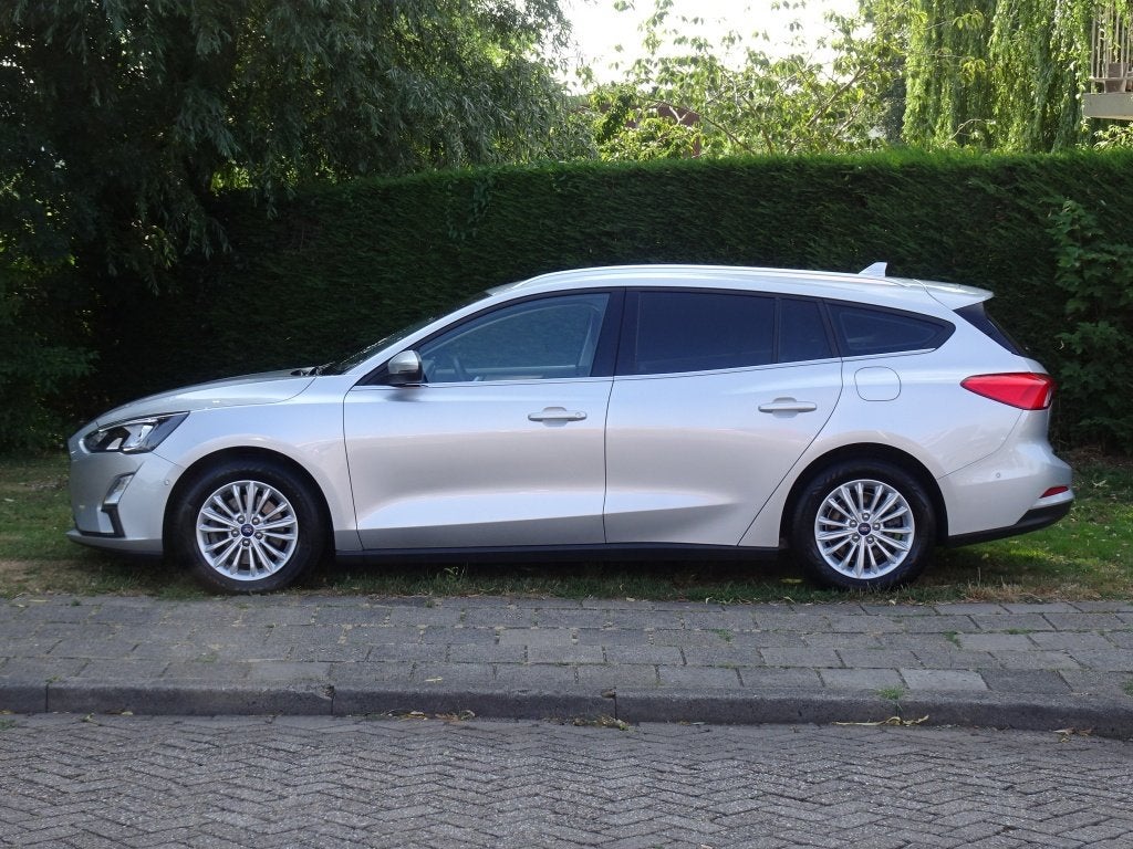 Ford FOCUS Wagon 1.0 125pk Hybrid Titanium met Navi, Camera, Stof, Gebruikt, Euro 6, Automatische klimaatregeling