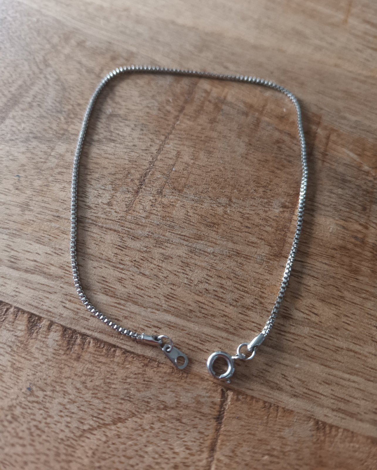 Zilverkleurige schakelarmband 23 cm, Ophalen of Verzenden, Gebruikt, Zilver, Overige materialen