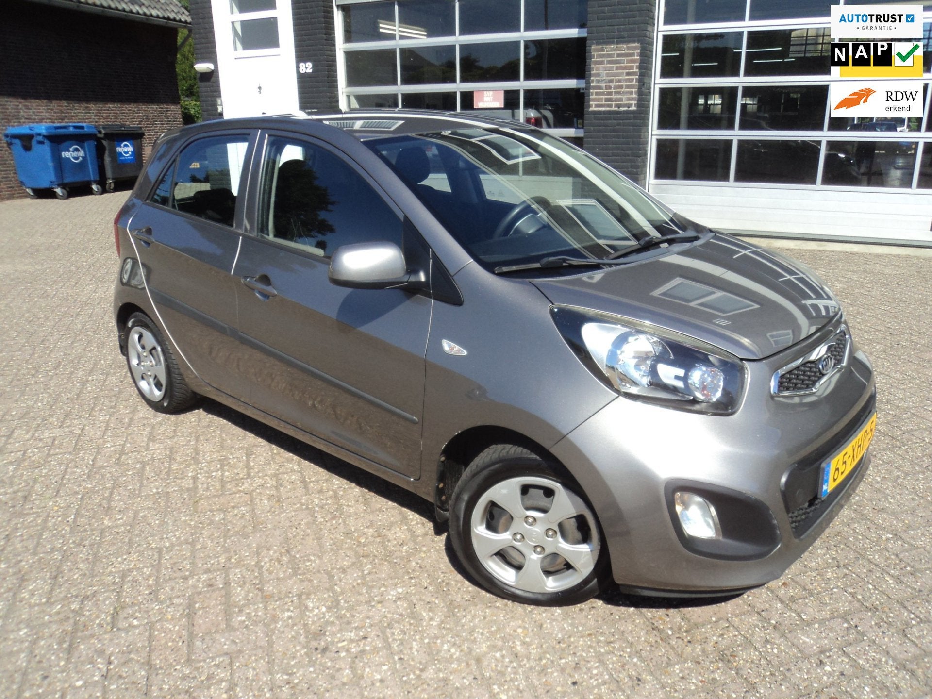 Kia Picanto 1.2 CVVT Comfort Pack Afneembare Trekhaak, Auto's, Kia, Gebruikt, Zwart, 4 cilinders, 850 kg