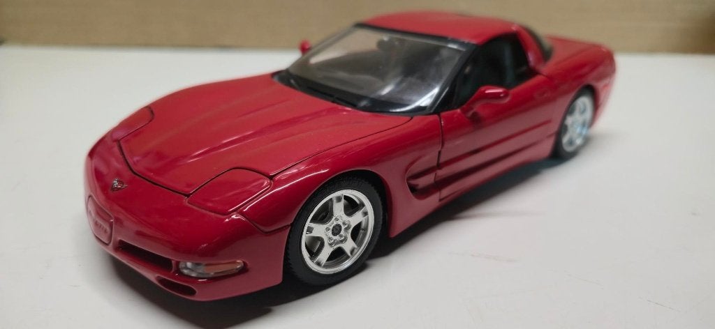 Chevrolet Corvette C5 5.7 Rood Bburago 1:18, Ophalen, Zo goed als nieuw, Auto, Bburago