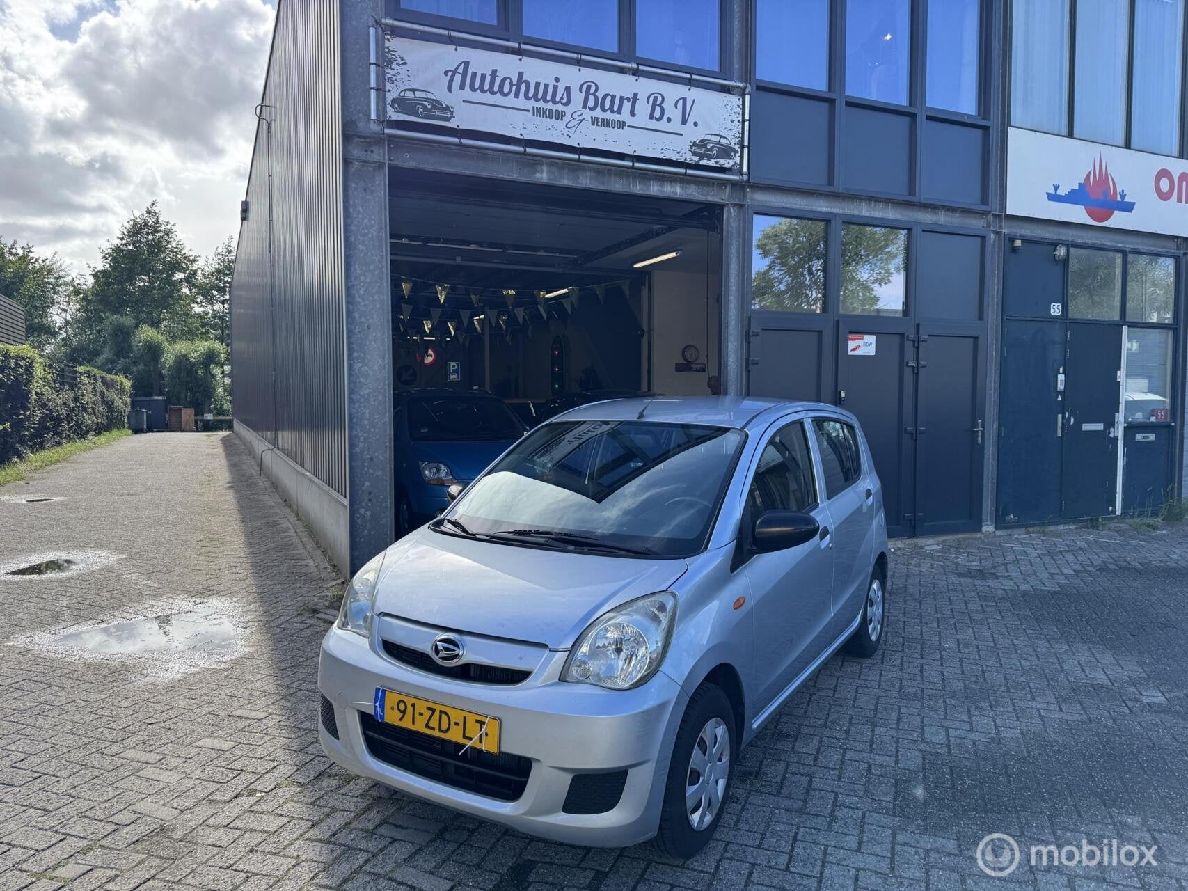Daihatsu Cuore 1.0 Trend Stuurbekrachtiging! Nieuwe APK! NAP, Auto's, Daihatsu, Voorwielaandrijving, Stof, 600 kg, Zwart