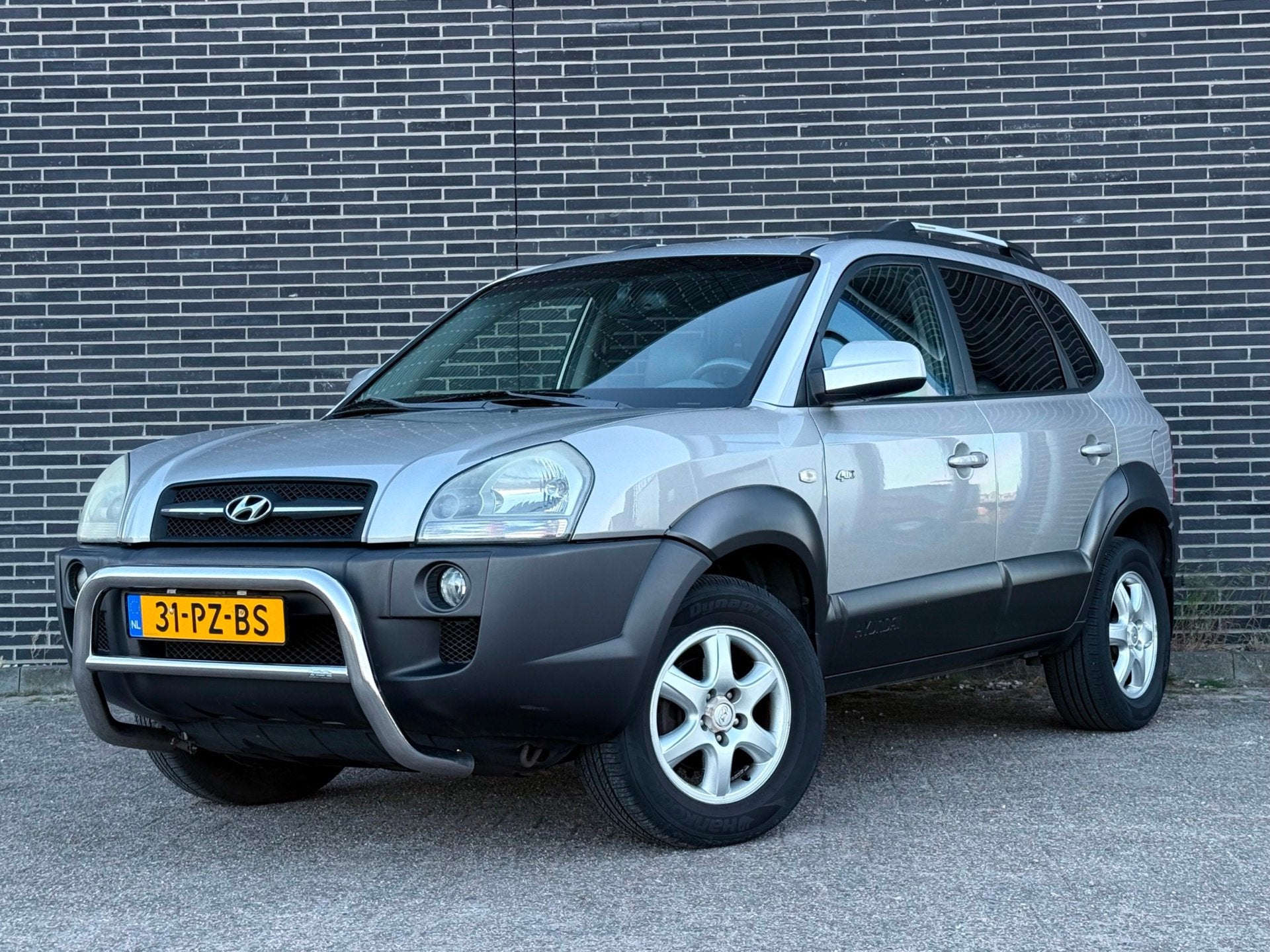 Hyundai Tucson 2.7i V6 4WD Style Automaat, Clima, Cruise!, Auto's, Automaat, Gebruikt, 2656 cc, Bedrijf