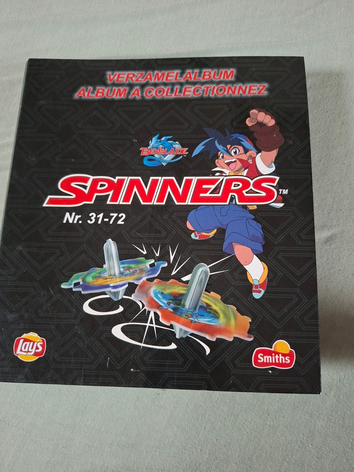 Beyblade Spinners Verzamelalbum met Spinners (Nr. 31-72), Ophalen of Verzenden, Zo goed als nieuw