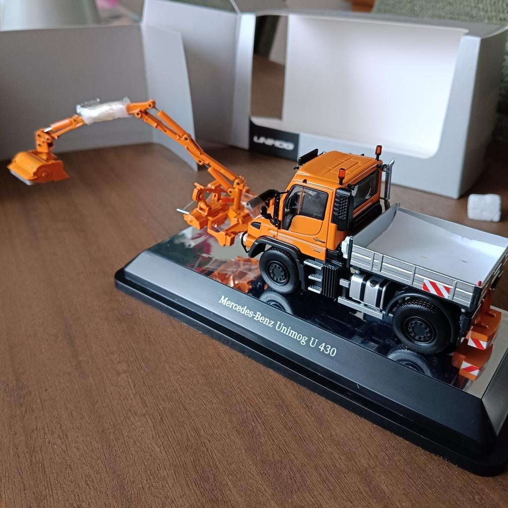 UNIMOG U430 KLEPELMAAIER NZG, Hobby en Vrije tijd, Modelauto's | 1:50, Ophalen of Verzenden, Nieuw, Hijskraan, Tractor of Landbouw