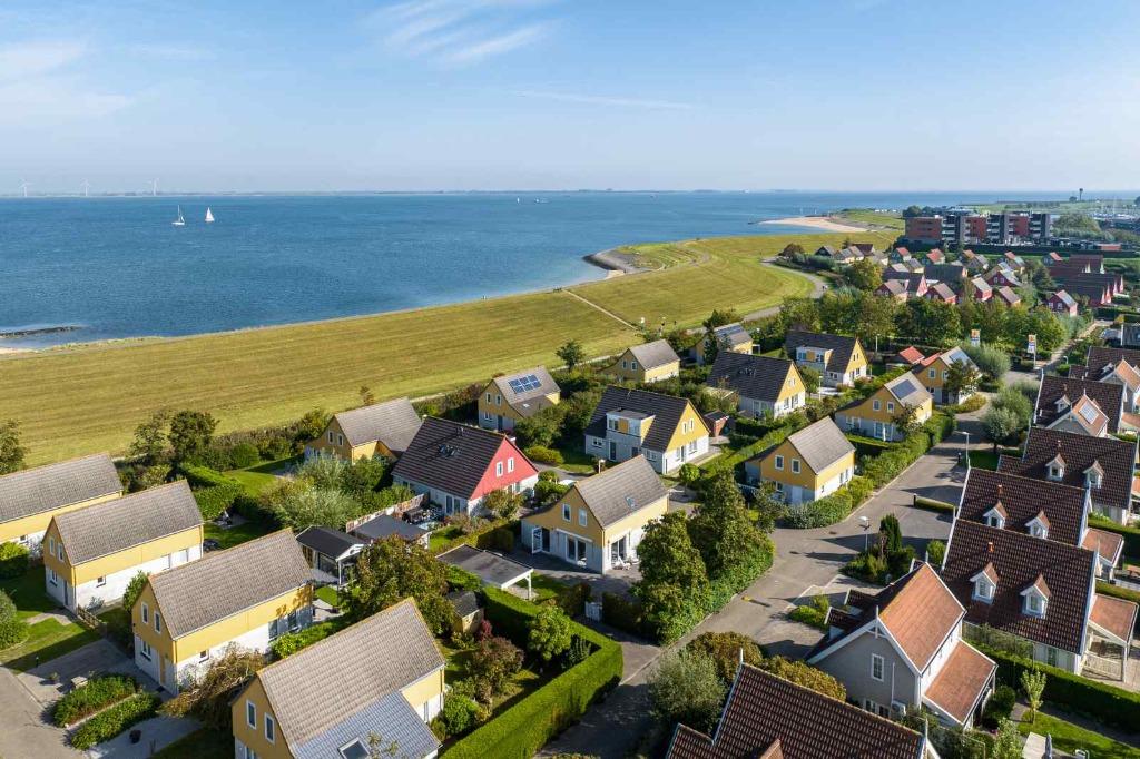 LAST MINUTE Zeeland: huis direct aan Oosterschelde!, Vakantie, 8 personen, 4 of meer slaapkamers, Wasmachine, Zeeland