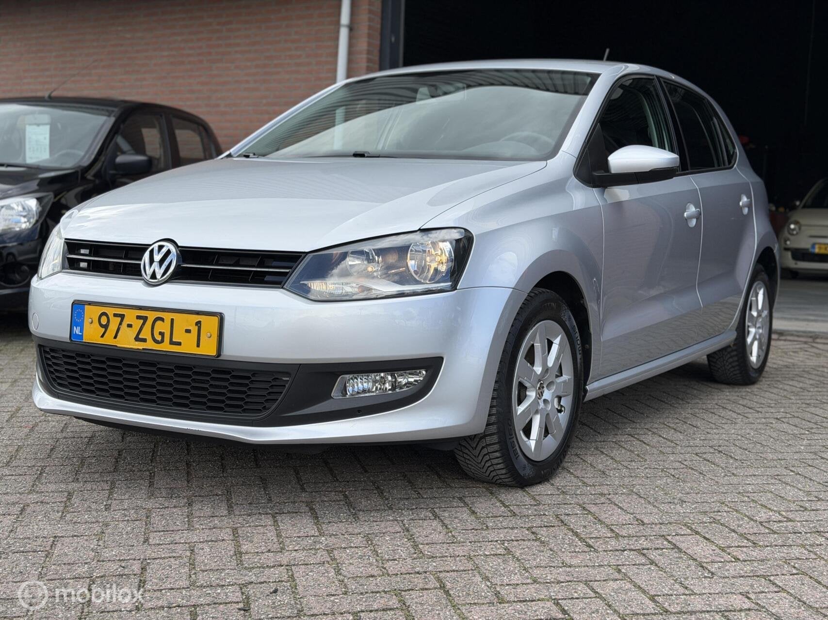Volkswagen Polo 1.2 TSI BlueMotion Comfortline 5DRS|AIRCO|BO, Auto's, Voorwielaandrijving, Euro 5, Stof, Zwart