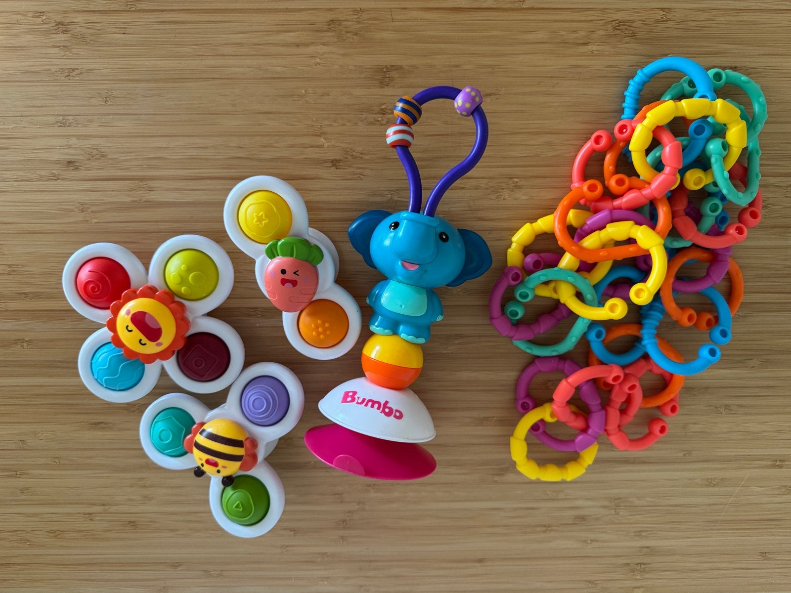Bumbo & Playgro speelgoedset: rammelaar, zuignap en ringen, Ophalen, Zo goed als nieuw, Rammelaar