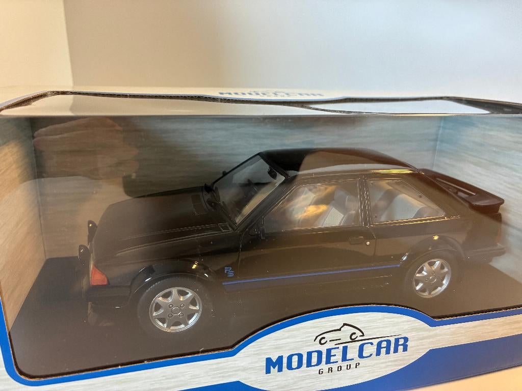 27521: Ford Escort RS Turbo - 1985 - MCG 1:18, Bottgerstr 2-14, 65439 Florsheim, Germany, Auto, Nieuw, Ophalen of Verzenden