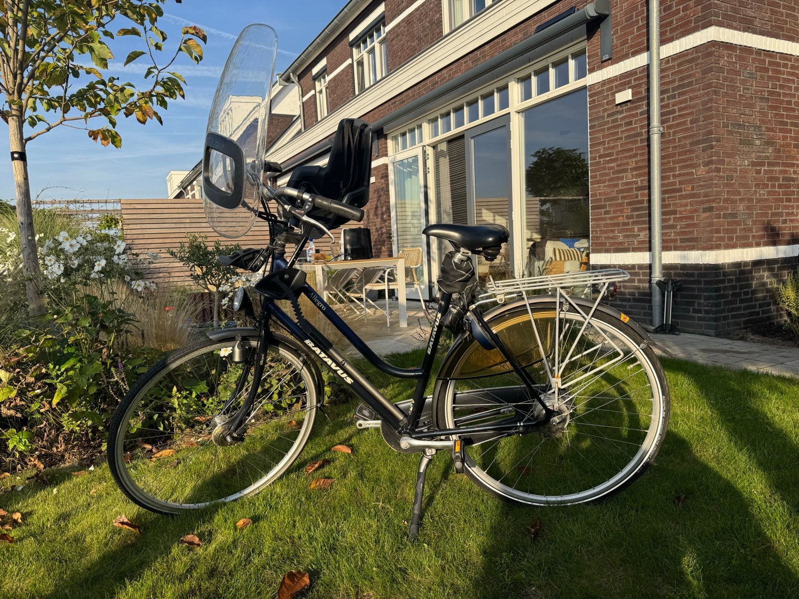 Foto 5 van Batavus fiets met Bobike kinderzitje en windscherm