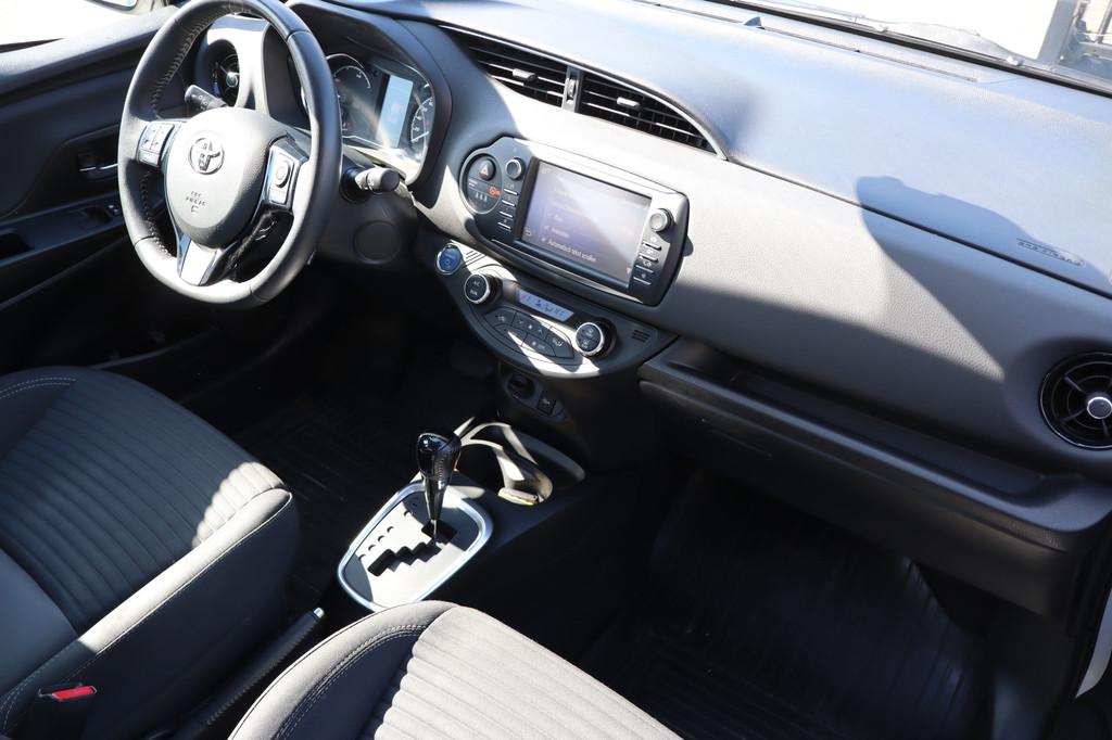 Toyota Yaris 1.5 Hybrid Automaat Dealeronderhouden/Achteruit, Auto's, Toyota, 12 maanden, Gebruikt, 4 cilinders, Bedrijf