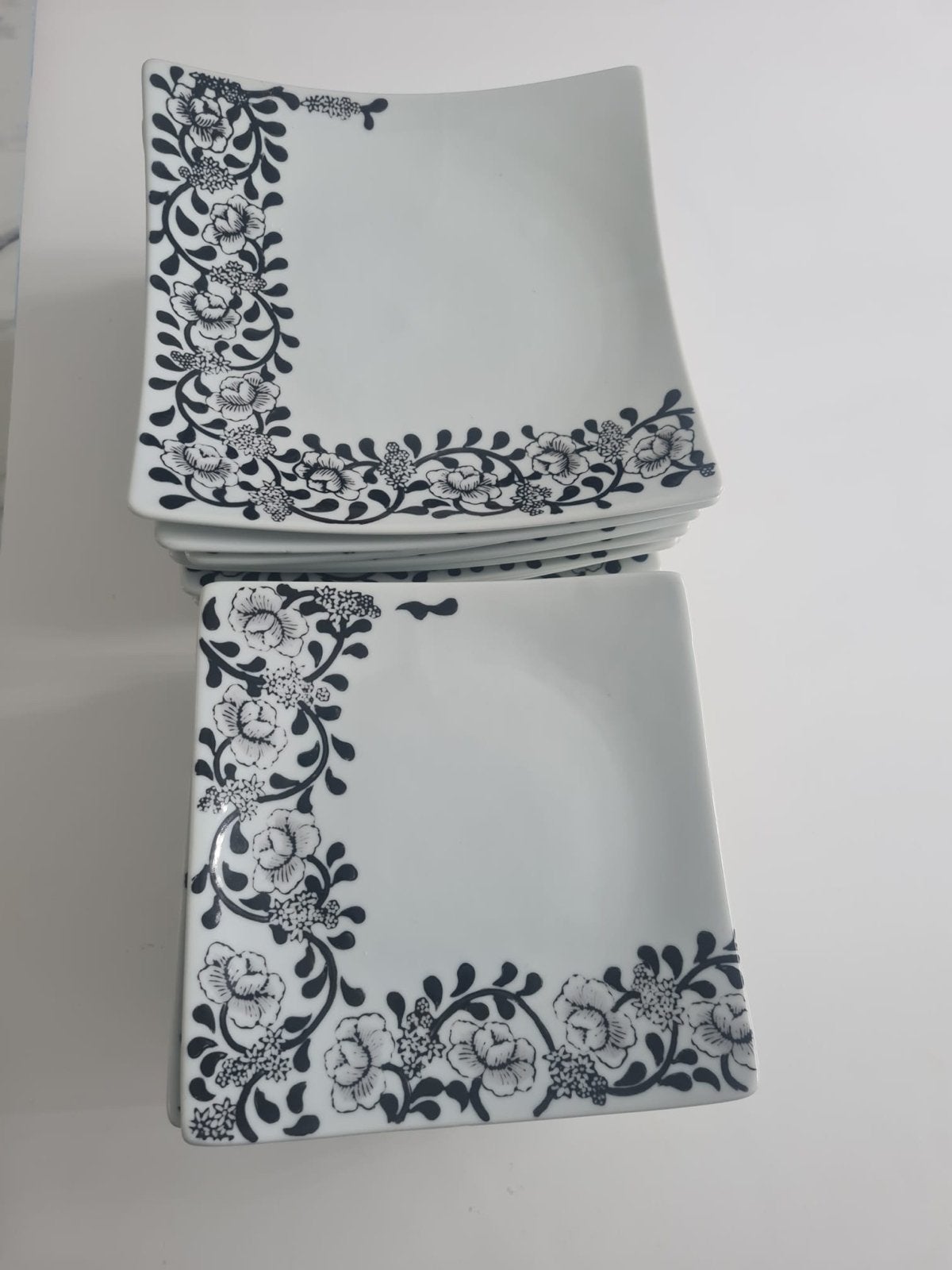 Set van 12 vierkante borden met bloemmotief, Ophalen of Verzenden, Zo goed als nieuw, Bord(en), Modern