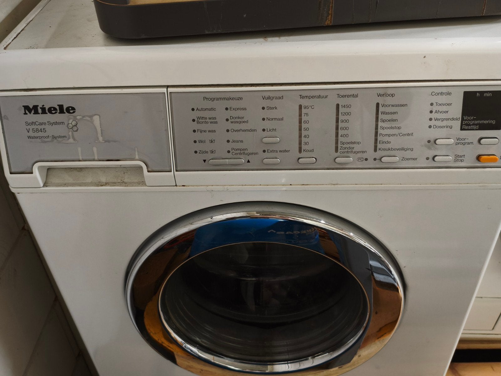 Miele wasmachine kapot, Ophalen