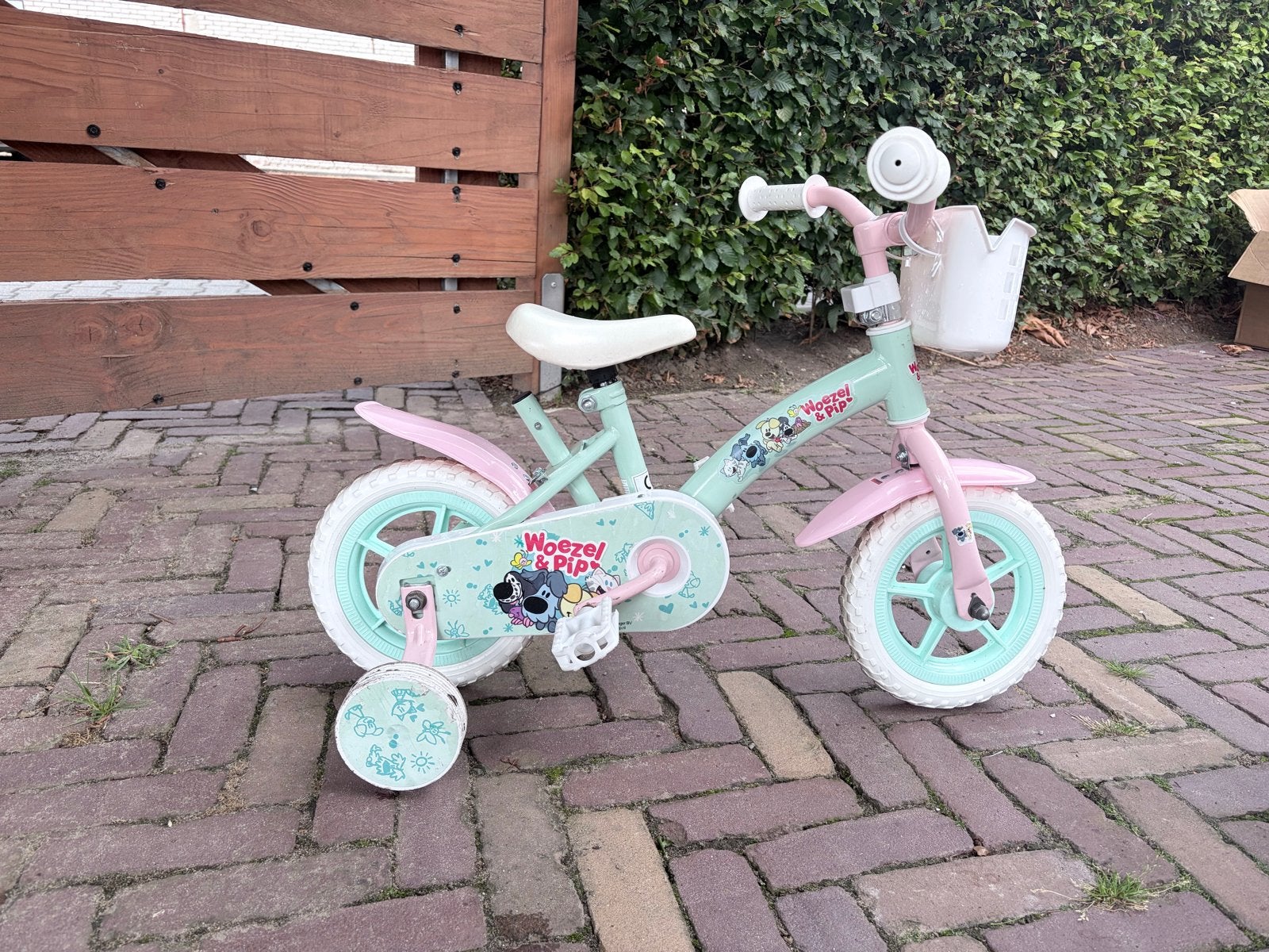 Woezel & Pip peuterfiets 10 inch, Fietsen en Brommers, Fietsen | Kinderfietsjes, Ophalen, Terugtraprem, Zijwieltjes, Gebruikt