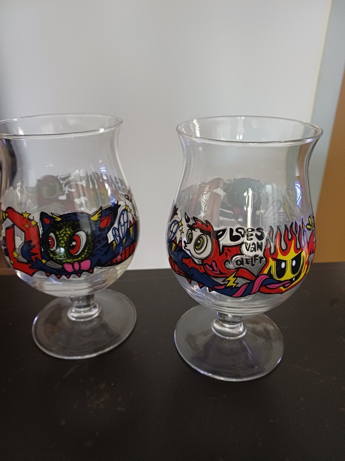 2x duvel glas loes van delft, Meerkleurig, Nieuw, Ophalen of Verzenden, Modern