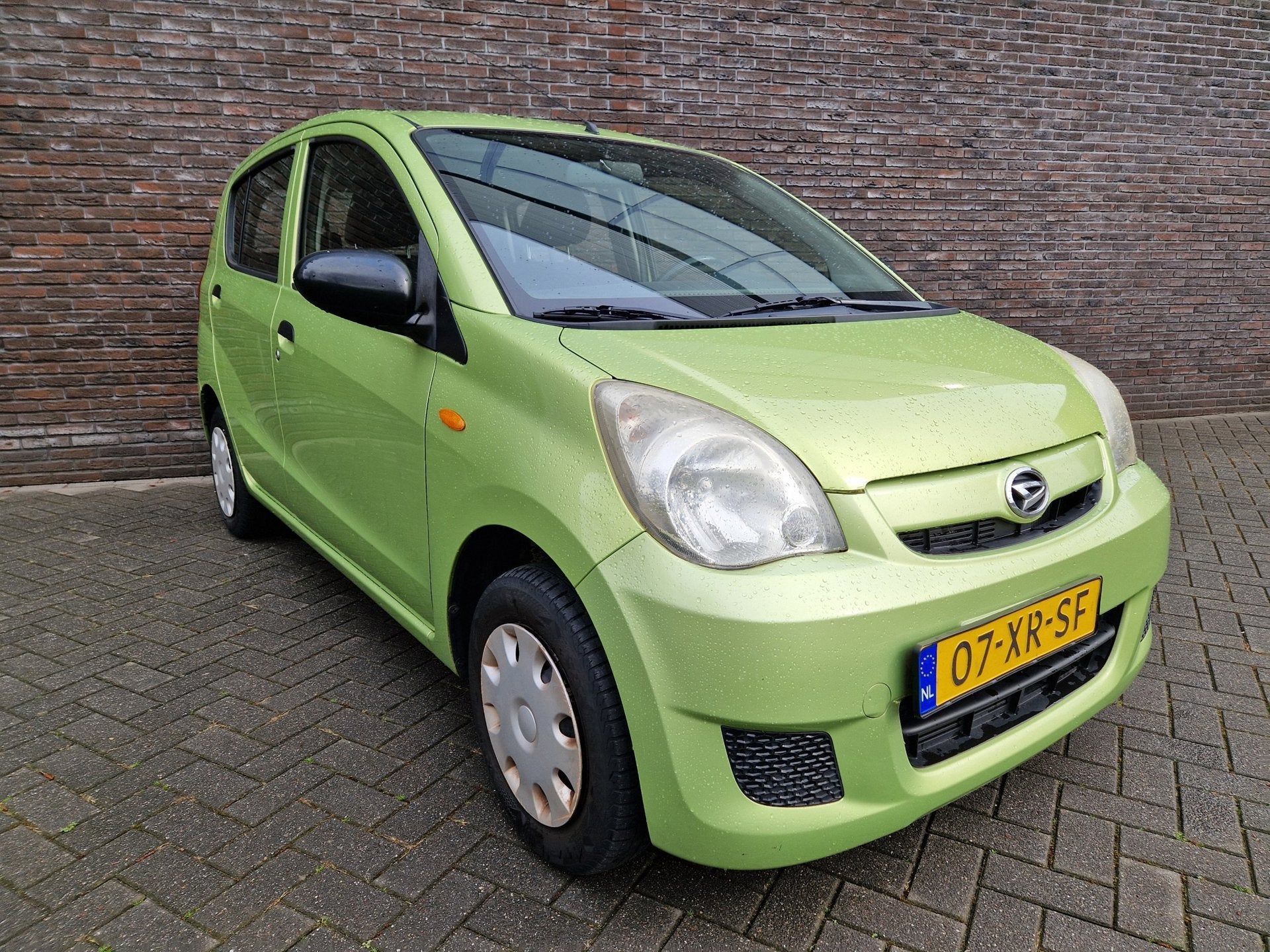 Daihatsu Cuore 1.0 Trend radio cd APK 03-27 dealer onderhoud, Auto's, Daihatsu, Voorwielaandrijving, Stof, Zwart, 18 €/maand