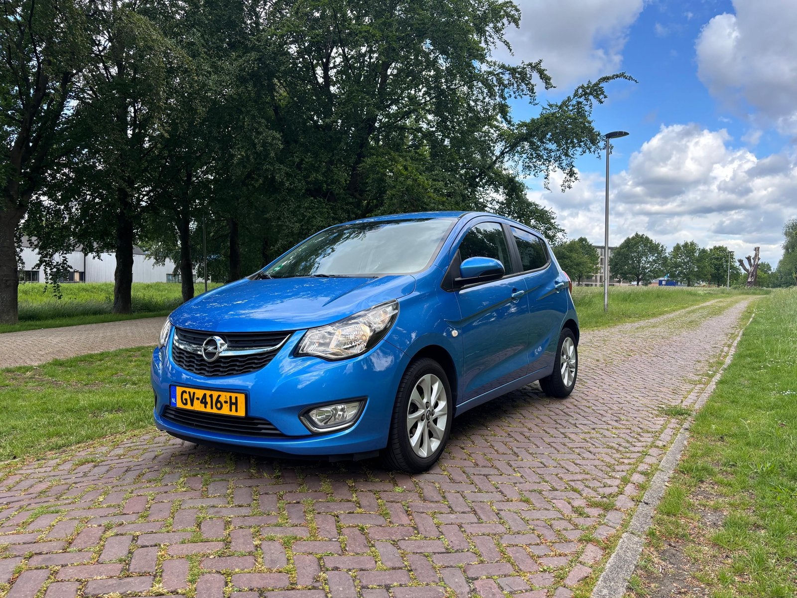 Opel Karl 1.0 Ecoflex 55KW 2015 Blauw, Auto's, Voorwielaandrijving, 839 kg, 74 pk, Blauw