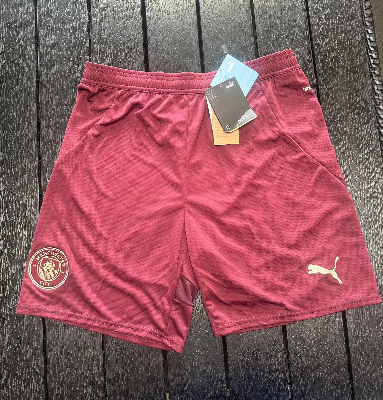 Nieuw sportbroekje van Puma x Manchester City - maat M, Maat 48/50 (M), Nieuw, Ophalen of Verzenden, Voetbal
