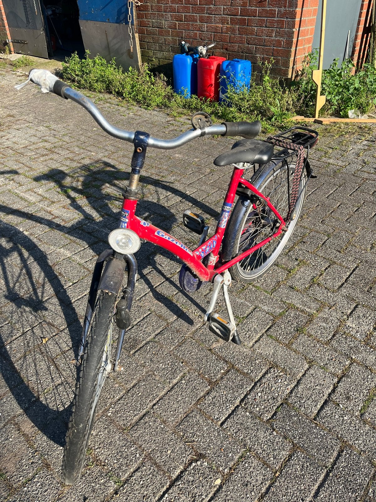 Rode kinderfiets - band lek, handvat mist, Ophalen, Gebruikt, Velgrem, 20 inch of meer