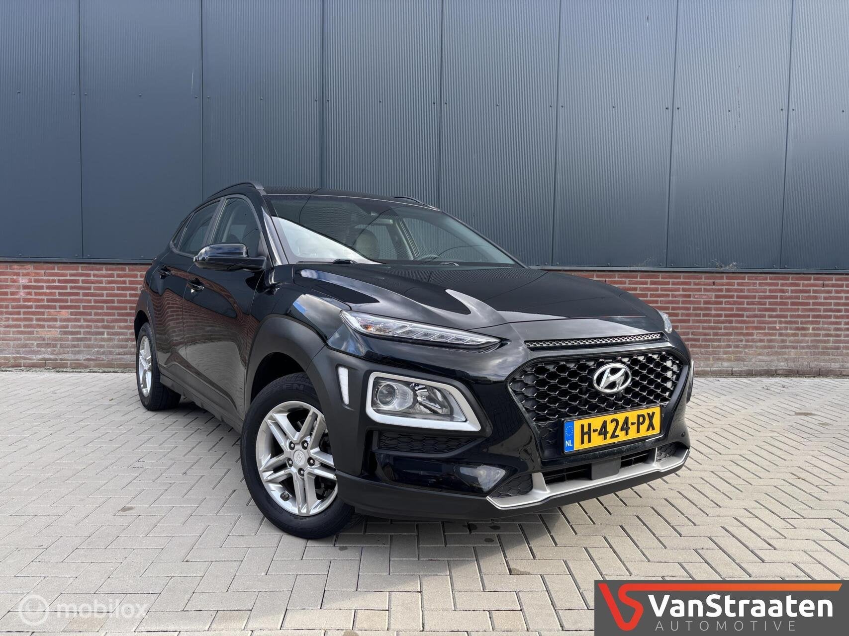 Hyundai Kona 1.0T Comfort | Carplay | Camera | Stoelverwarmi, Voorwielaandrijving, Stof, Gebruikt, Zwart