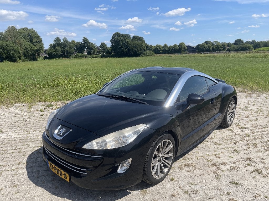 Peugeot RCZ 1.6 THP 2011 Zwart, Auto's, Peugeot, Voorwielaandrijving, Euro 5, 15 km/l, Bluetooth