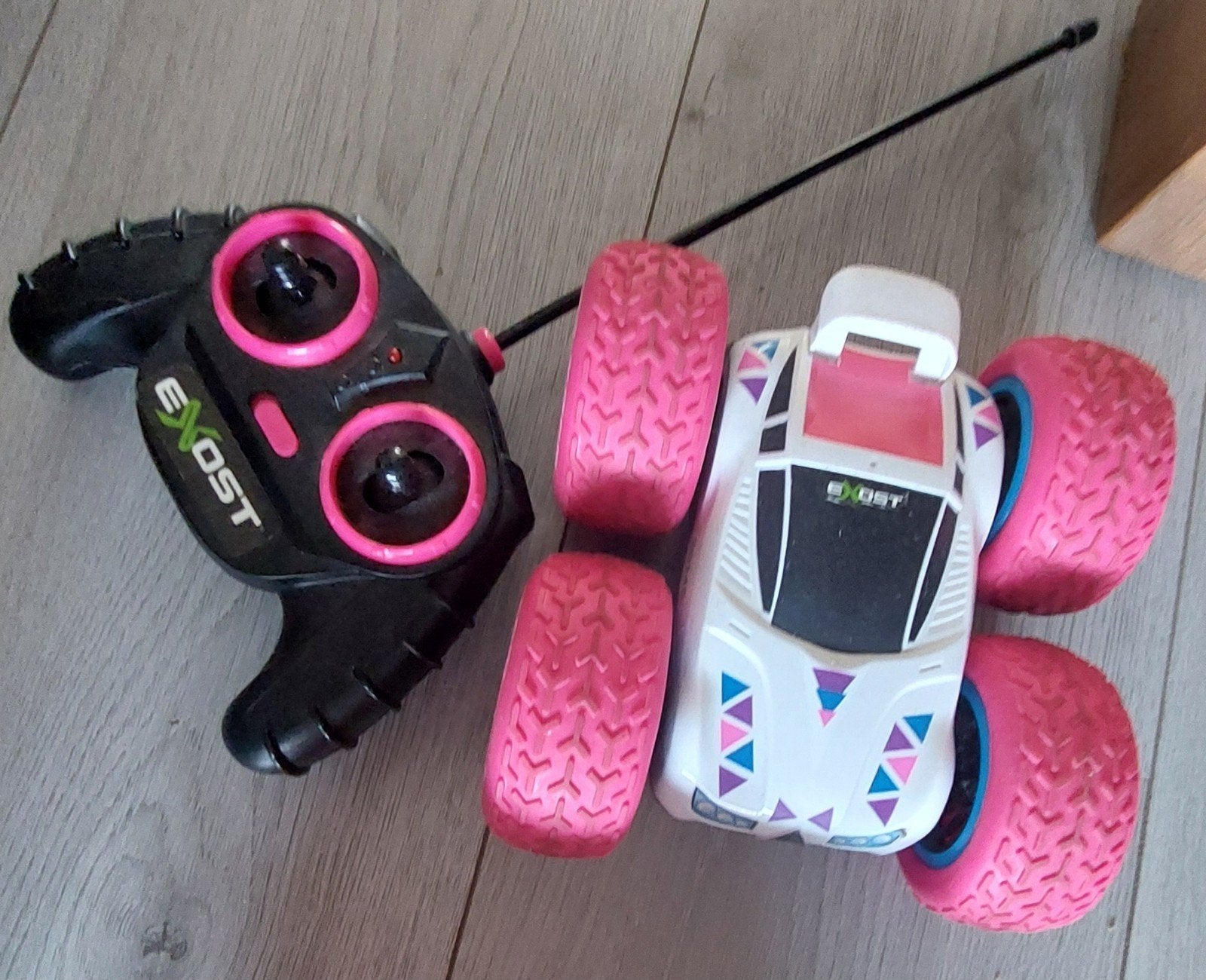 Exost 360 Mini Flip RC Auto - Wit/Roze, Elektro, Gebruikt, Auto offroad, Ophalen of Verzenden