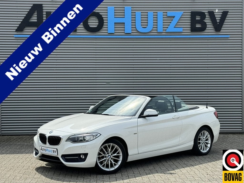 BMW 2 Serie Cabrio 218i Executive Sport Line Leer Navigatie, Keurmerk '100% Onderhouden', 745 kg, Gebruikt, 4 stoelen