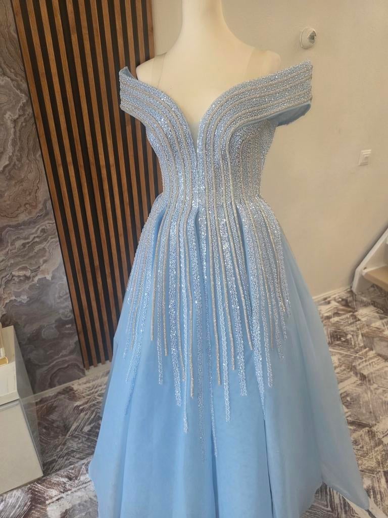 Lichtblauwe galajurk met glitterdetails, Ophalen of Verzenden