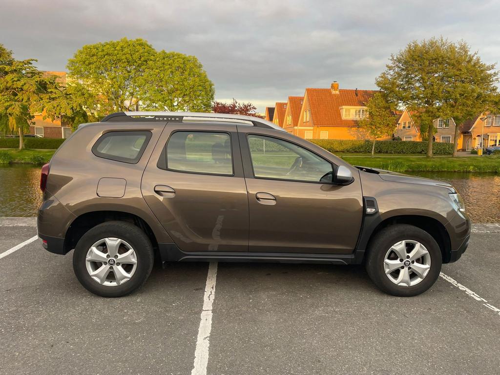 Dacia Duster 1.3 TCe Comfort 130PK HOGE INSTAP TREKHAAK NAVI, Gebruikt, Zwart, 4 cilinders, 1333 cc