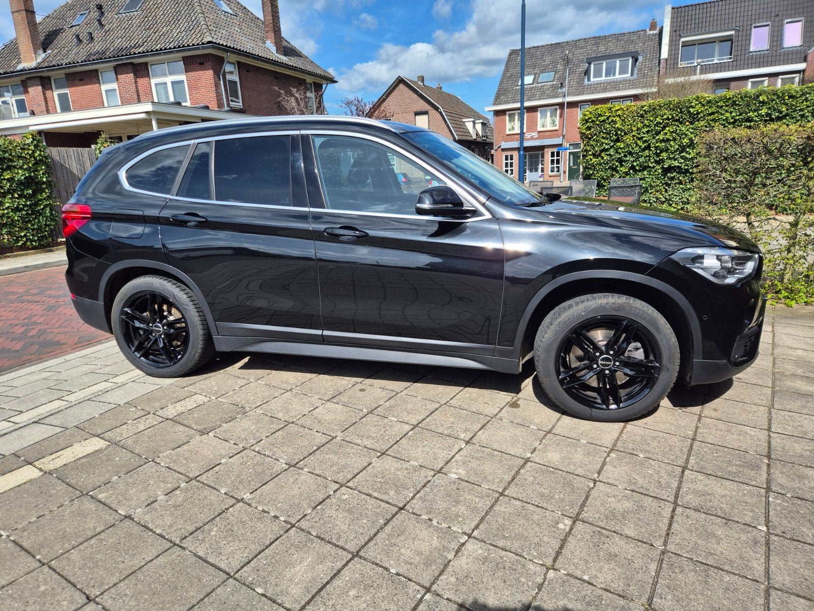 BMW X1 Sdrive20i 192pk Aut 2017 Zwart, Auto's, 1998 cc, Achterwielaandrijving, 1800 kg, Zwart