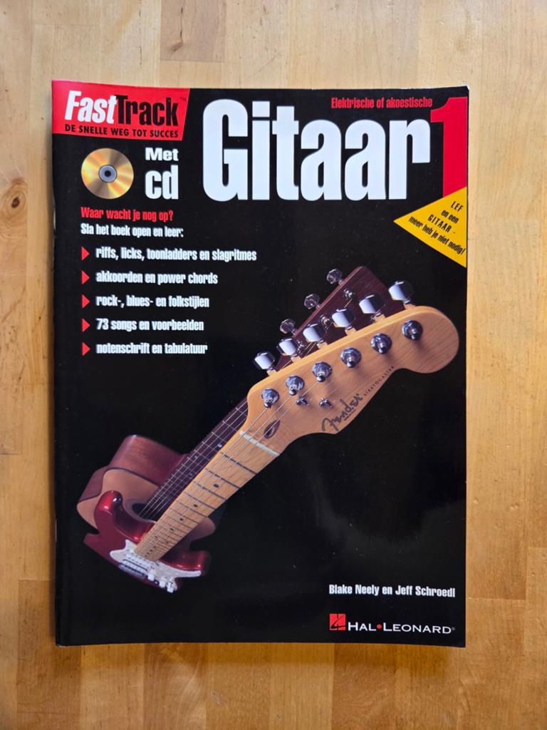 Fast Track Gitaar 1 - Elektrische of Akoestische Gitaar, Boeken, Studieboeken en Cursussen, Nieuw, Ophalen of Verzenden, Blake Neely en Jeff Schroedl