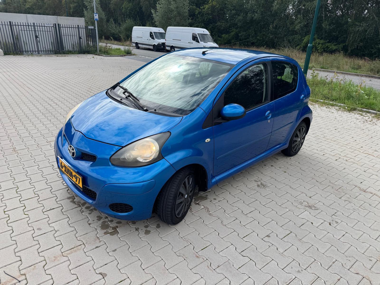Toyota Aygo 1.0 12V Vvt-i 5DRS 2009 Blauw, Voorwielaandrijving, Stof, Zwart, 68 pk