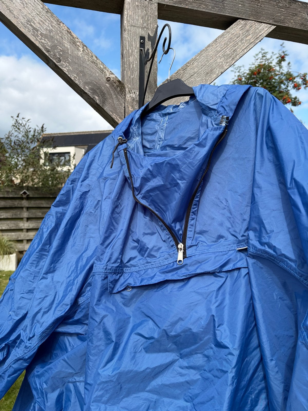 Birdland backpack poncho - Blauw, Ophalen of Verzenden, Gebruikt, Regenponcho, Dames